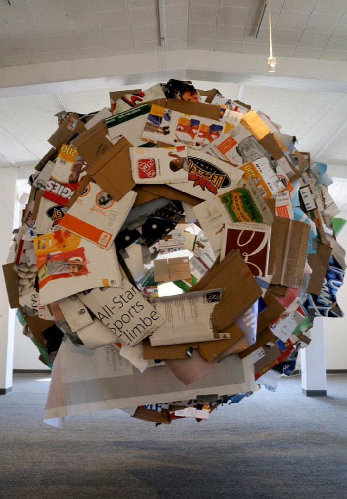 Cocoon sculpture with papers and cardboards